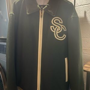 Forest green soda club Pelle Pelle /w cream & tan leather lining